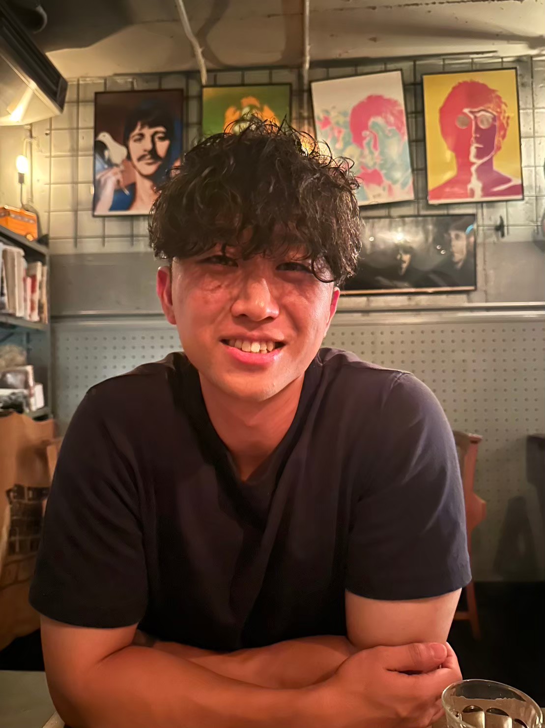 Champion is smiling and chuckling.